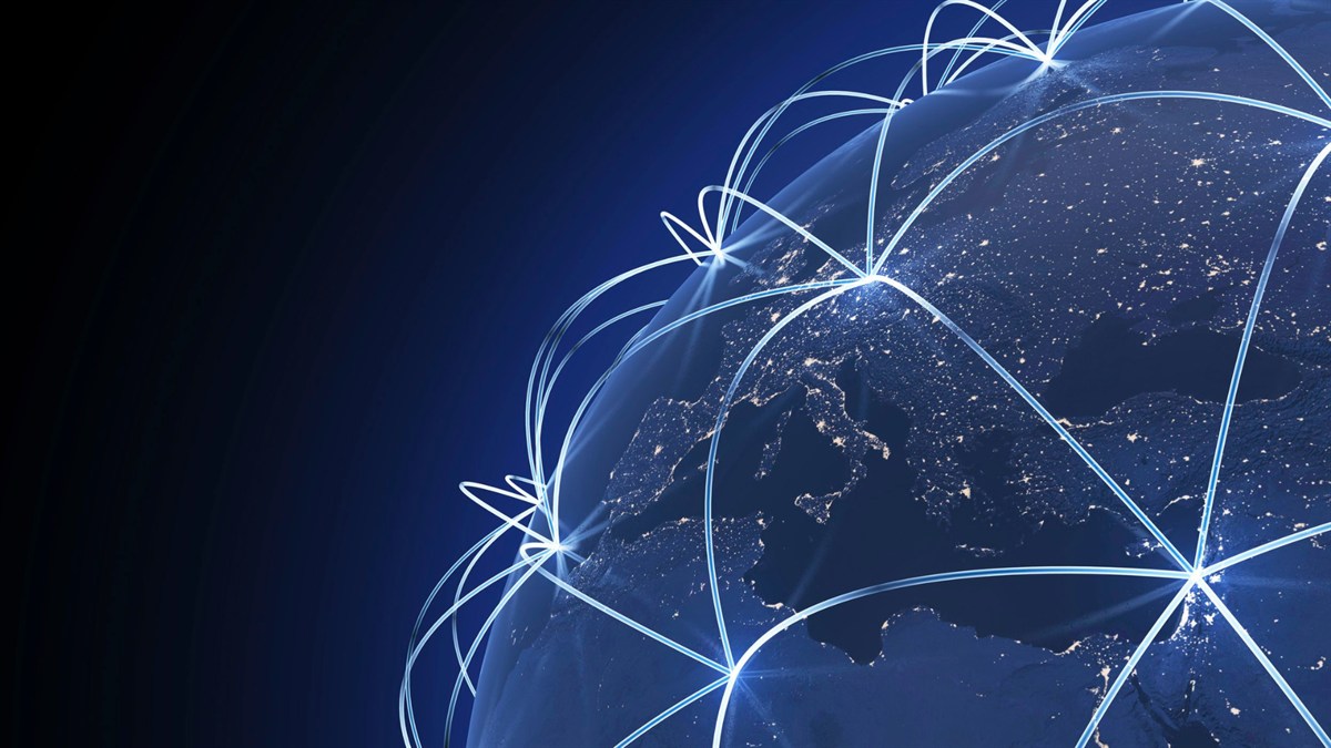 Illuminated global logistics network, representing duty-free trade between the US, Canada, and Mexico